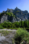 Mountain peak Corne du Chamois (Chamois Horns, 2523m) seen from the river Le Giffre
